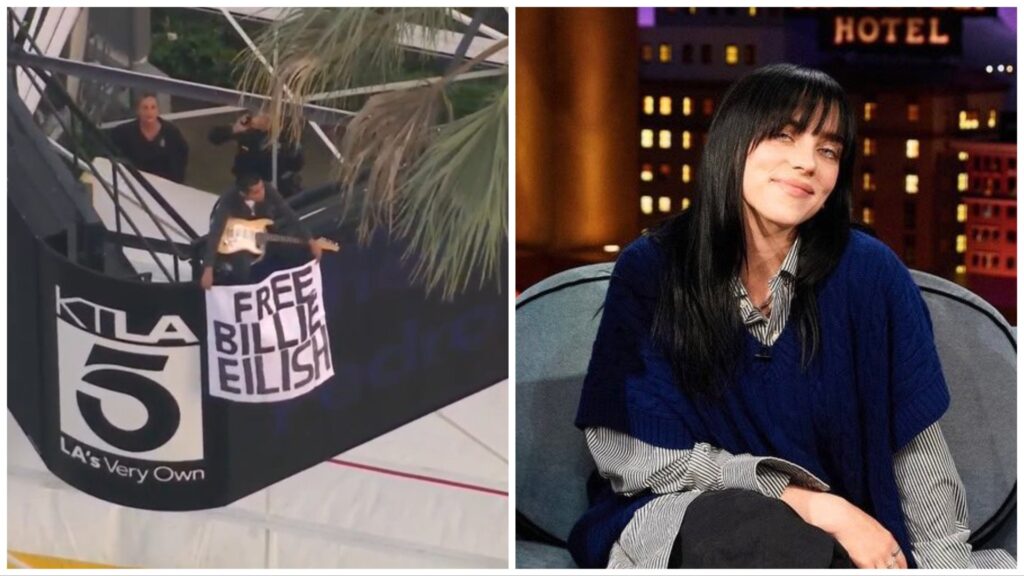 Man climbs tower with Free Billie Eilish poster